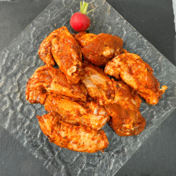 Alas adobadas de pollo
